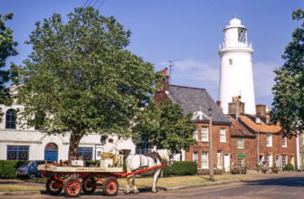 Adams brewery dray and lighthouse in town centre, Southwold, Suffolk, England, UK July 1971.