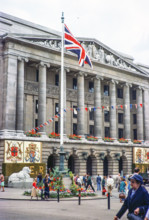Flags and bunting decorating Council House building for Queen Elizabeth Silver Jubilee celebrations