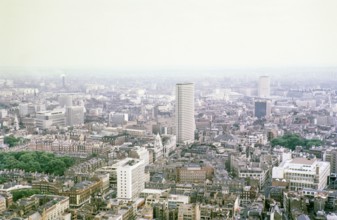 View south east from Post Office tower to Centre Point and Soho,  central London, England, UK 1967.