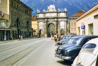 Triumphal arch in Maria-Theresien-Strasse street city centre of Innsbruck, Austria, Europe 1950s -