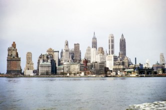 City skyline of skyscrapers, Manhattan, New York, NY State, USA c 1953.