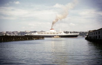 SS Cristoforo Colombo ocean liner ship, East River, Manhattan, New York, NY State, USA, c 1954.