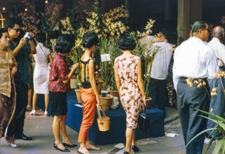 People attending flower show at the Singapore Turf Club, The 4th World Orchid Conference,