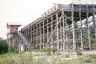 Open Cast gravel-pumping tin mine Malaya, Malaysia, south east Asia 1964 -  pumping raises the