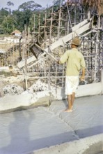 Open Cast gravel-pumping tin mine Malaya, Malaysia, south east Asia 1964 - Ore separation in the