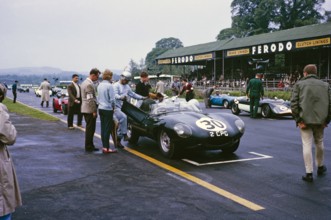 Whitsun Sports car race 3 June 1963, John Coundley in Jaguar D-type car on start line, Goodwood,
