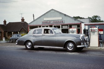 Bentley S1 Saloon car at petrol pumps of Riseley Garage, Berkshire, England, UK May 1961.