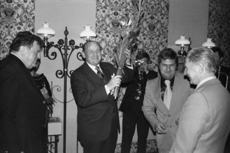 Wienerwald hotel manager Friedrich Jahn celebrating his naturalization with Franz Josef Strauss,