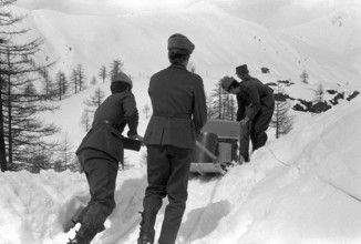Artillary soldiers snowed in on the Simplon 1977