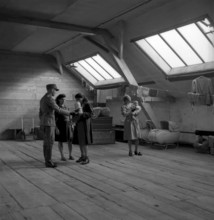 Camp for internees in Adliswil, women and children in camp on loft, 1945