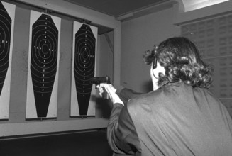 Policewoman Emma Meier at target practice 1981