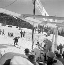 Longines technicians install the apparatus for time recording with Chronocamera, 1950