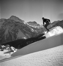 Ski instructor shows proper way to ski, jump, Arosa 1938