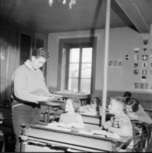 Boy giving lesson, filling in for the sicken teacher, Chavannes-des-Bois 1957
