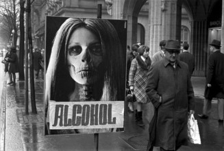 Poster warning of drug abuse has been taped over with the word alcohol, 1969
