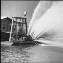 Dredger taking out gravel, shingle from the bottom, 1957