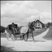 Sulz, postman on horse-drawn carriage 1940