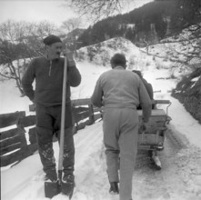 Man and sleigh on his way in the Grisons,  1953