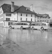 Post bus with trailer doing public transports from Aarau to Frick 1950