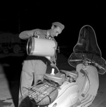 Christmas Eve 1955: petrol pump attendant in Lausanne