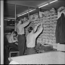Rush before christmas, temporary post office in a gym, Berne 1957