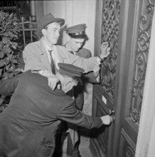 Drivers of the Welti-Furrer taxi escorting drunk at home, Zurich 1951