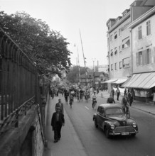 BBC closing time, cyclists and pedestrian in Baden, 1951