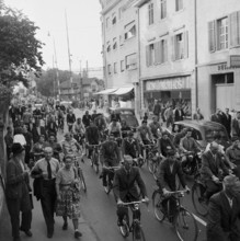 BBC closing time, cyclists and pedestrian in Baden, 1951