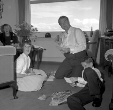 Red Skelton with his family in hotel room, Zurich 1957