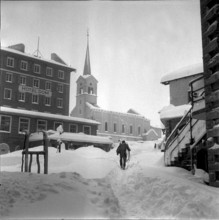 Chimney sweep walking in Saas Fee, 1945