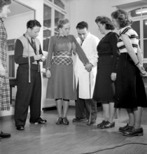 Taking measurements vocational school for tailor, Zurich 1949