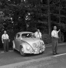 Car, hood dameged in an accident near Gruyere 1959