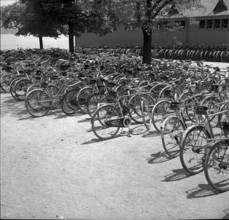 Bicycles parked at the entrance to a seaside swimming bath in Zurich 1952