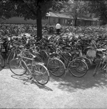 Bicycles parked at the entrance to a seaside swimming bath in Zurich 1952