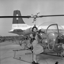 Onlookers waiting Miss Mac Factor's arrival in Zurich 1957