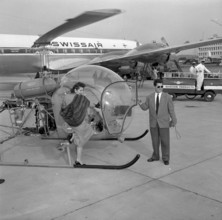 Onlookers waiting Miss Mac Factor's arrival in Zurich 1957