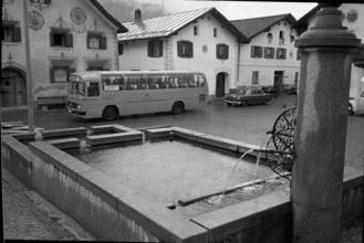 Fountain at village square in Scuol GR