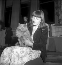 Woman with her blue persian cat, International cat exhibition Zurich 1946