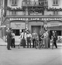 Jury: men with bicycles, Floral decoration contest in Geneva 1942