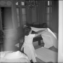 Basle, chambermaid bedding, Hotel drei Konige 1954