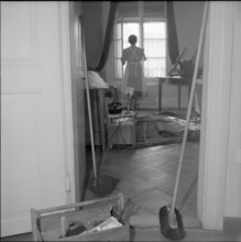 Basle, chambermaid cleaning a room, Hotel drei Konige 1954