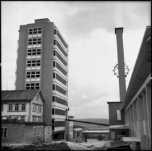 Front of high-rise building of watch company Langendorf SA built in one day, 1957