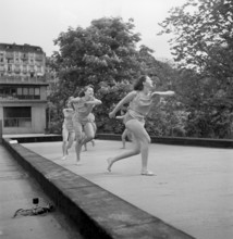 School for Gymnastics, Lausanne 1940: women do gymnastics outdoor