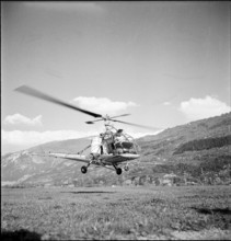 Crop duster spraying insecticide to combat cockchafer in Valais 1957