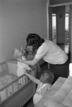 Woman looking after her children, Geneva 1966