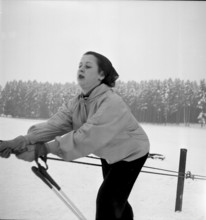 Woman on ski lift at Chalet-a-Gobet, Lausanne 1952