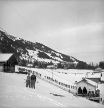 Skiers on ski lift in Adelboden, 1945