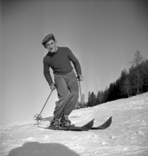 Ski instructor shows proper way to ski, Davos 1940