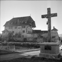 Crucifix in front of Corbieres Castle, 1954
