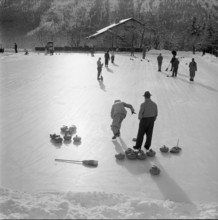 Men playing curling in St. Moritz 1947